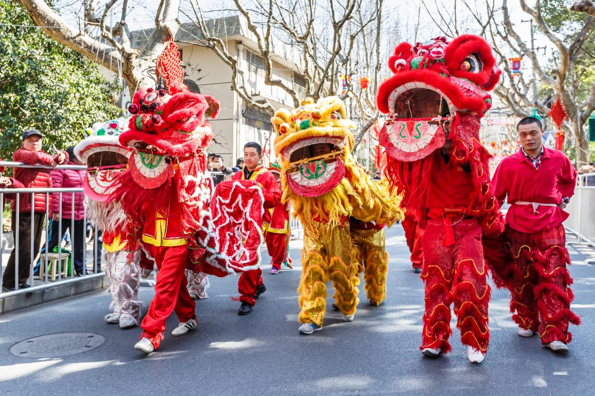 Shanghai,China – on February 11,2017:Dragon and lion parade dance show in the Chinese Lantern Festival.